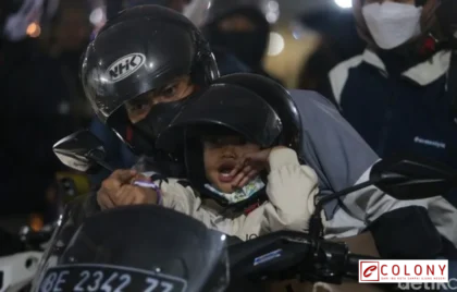 ekspresi anak mudik naik motor